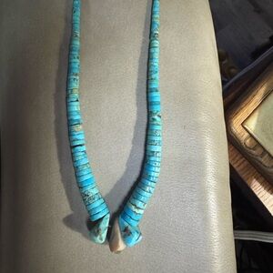 Women’s reproduction turquoise necklace.